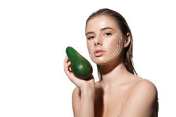 Image showing Youth secrets. Beautiful young woman over white background. Cosmetics and makeup, lifting and aging concept.