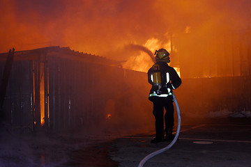 Image showing Burning house