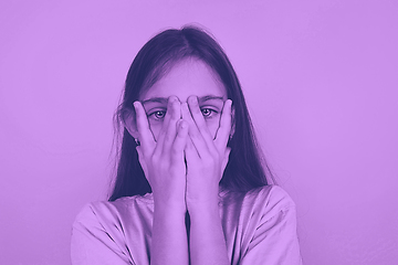 Image showing Close up portrait of caucasian girl isolated on studio background. Modern and trendy duotone effect