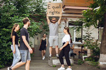 Image showing Dude with sign - man stands protesting things that annoy him