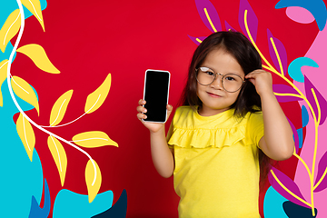 Image showing Asian little girl portrait isolated on bright, modern illustrated background.