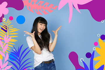 Image showing Asian woman\'s portrait isolated on bright, modern illustrated background.