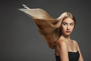 Image showing Beautiful model with long smooth, flying blonde hair