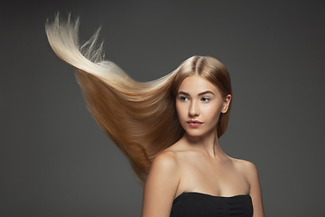 Image showing Beautiful model with long smooth, flying blonde hair