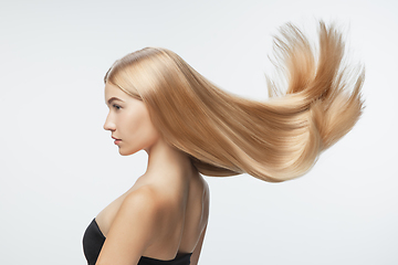 Image showing Beautiful model with long smooth, flying blonde hair