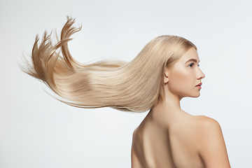 Image showing Beautiful model with long smooth, flying blonde hair