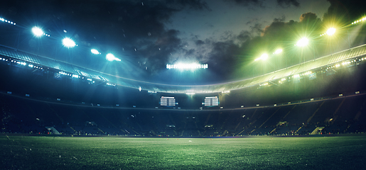 Image showing Full stadium and neoned colorful flashlights background