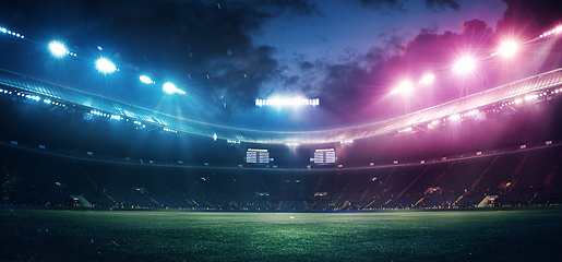 Image showing Full stadium and neoned colorful flashlights background