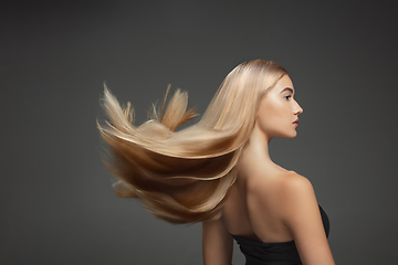 Image showing Beautiful model with long smooth, flying blonde hair