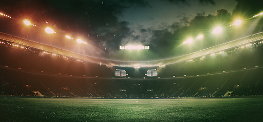Image showing Full stadium and neoned colorful flashlights background