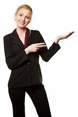 Image showing Woman pointing and holding