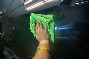 Image showing Auto detailing on carwash service, restore the paint of vehicle