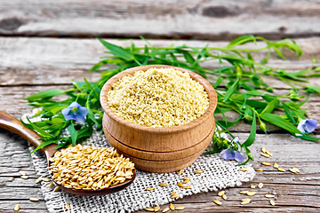 Image showing Bran flaxseed in bowl on grey boar