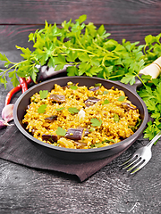 Image showing Bulgur with eggplant in pan on table