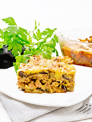 Image showing Casserole of meat and eggplant in plate on table