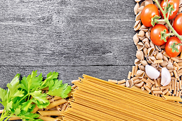 Image showing Frame different whole grain and rye pasta on black board