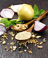 Image showing Onion powder and flakes in spoons on table