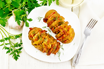 Image showing Potatoes puff smoked bacon in plate on board top