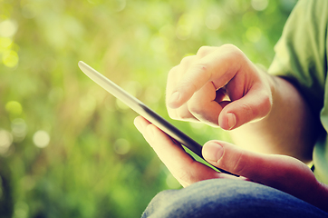 Image showing Man holding tablet