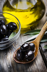 Image showing Olives and olive oil