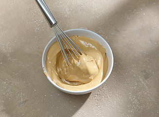 Image showing bowl of whipped instant coffee with sugar and water