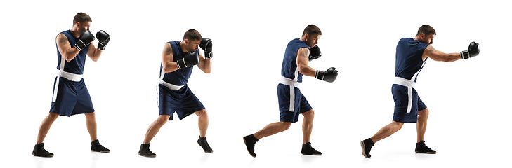 Image showing Young boxer against white studio background in motion of step-to-step kicking