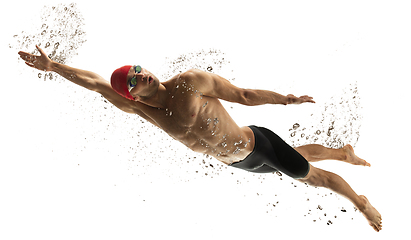 Image showing Caucasian professional sportsman, swimmer training isolated on white studio background