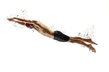 Image showing Caucasian professional sportsman, swimmer training isolated on white studio background