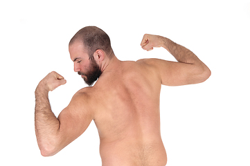 Image showing Man standing from back shirtless showing his muscles