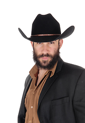 Image showing Man in striped jacket and cowboy hat, in a portrait image