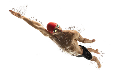 Image showing Caucasian professional sportsman, swimmer training isolated on white studio background