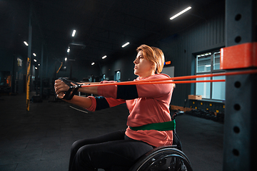 Image showing Disabled woman training in the gym of rehabilitation center