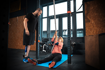 Image showing Disabled woman training in the gym of rehabilitation center