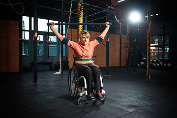 Image showing Disabled woman training in the gym of rehabilitation center