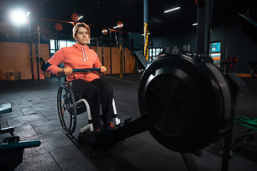 Image showing Disabled woman training in the gym of rehabilitation center