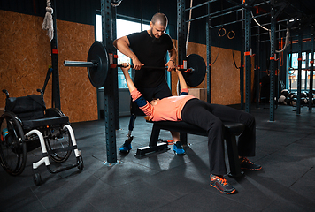 Image showing Disabled woman training in the gym of rehabilitation center