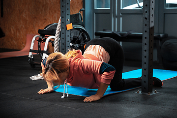 Image showing Disabled woman training in the gym of rehabilitation center