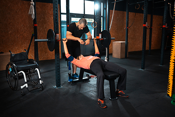 Image showing Disabled woman training in the gym of rehabilitation center