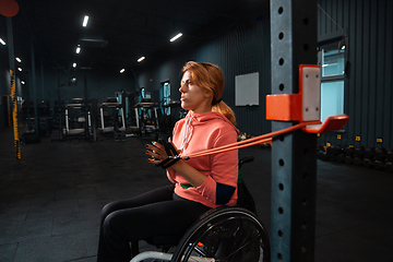 Image showing Disabled woman training in the gym of rehabilitation center