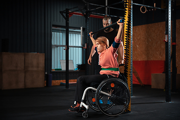 Image showing Disabled woman training in the gym of rehabilitation center