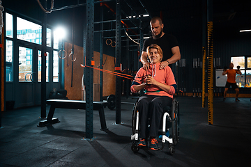 Image showing Disabled woman training in the gym of rehabilitation center