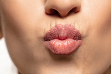 Image showing Close-up shoot of beautiful female lips with natural lipstick make up