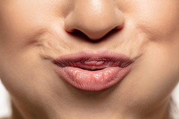 Image showing Close-up shoot of beautiful female lips with natural lipstick make up