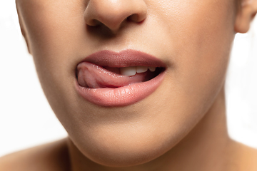 Image showing Close-up shoot of beautiful female lips with natural lipstick make up
