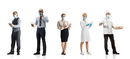 Image showing Group of people with different professions isolated on white studio background, horizontal