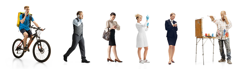 Image showing Group of people with different professions isolated on white studio background, horizontal