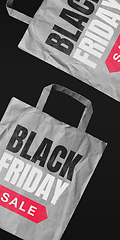 Image showing Shopping bags with lettering black friday, sales concept. Flyer with copyspace. Dark neoned background