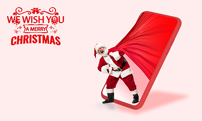 Image showing Emotional Santa Claus greeting with New Year 2021 and Christmas. Flyer with copyspace