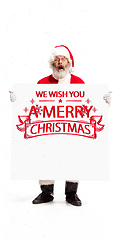 Image showing Emotional Santa Claus greeting with New Year 2021 and Christmas. Flyer with copyspace