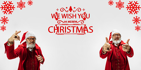 Image showing Emotional Santa Claus greeting with New Year 2021 and Christmas. Flyer with copyspace